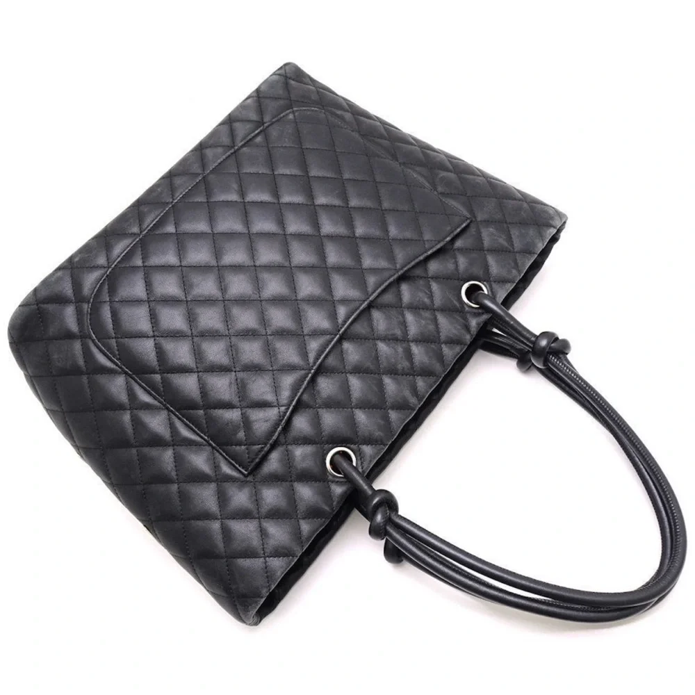 CHANEL Black Quilted Leather Shoulder Tote with White CC Emblem